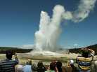 Tourists watch the Old Faithful geyser, which erupts, on average, every 90 minutes in the Yellowstone National Park. Tourists watch the Old Faithful geyser, which erupts, on average, every 90 minutes in the Yellowstone National Park.